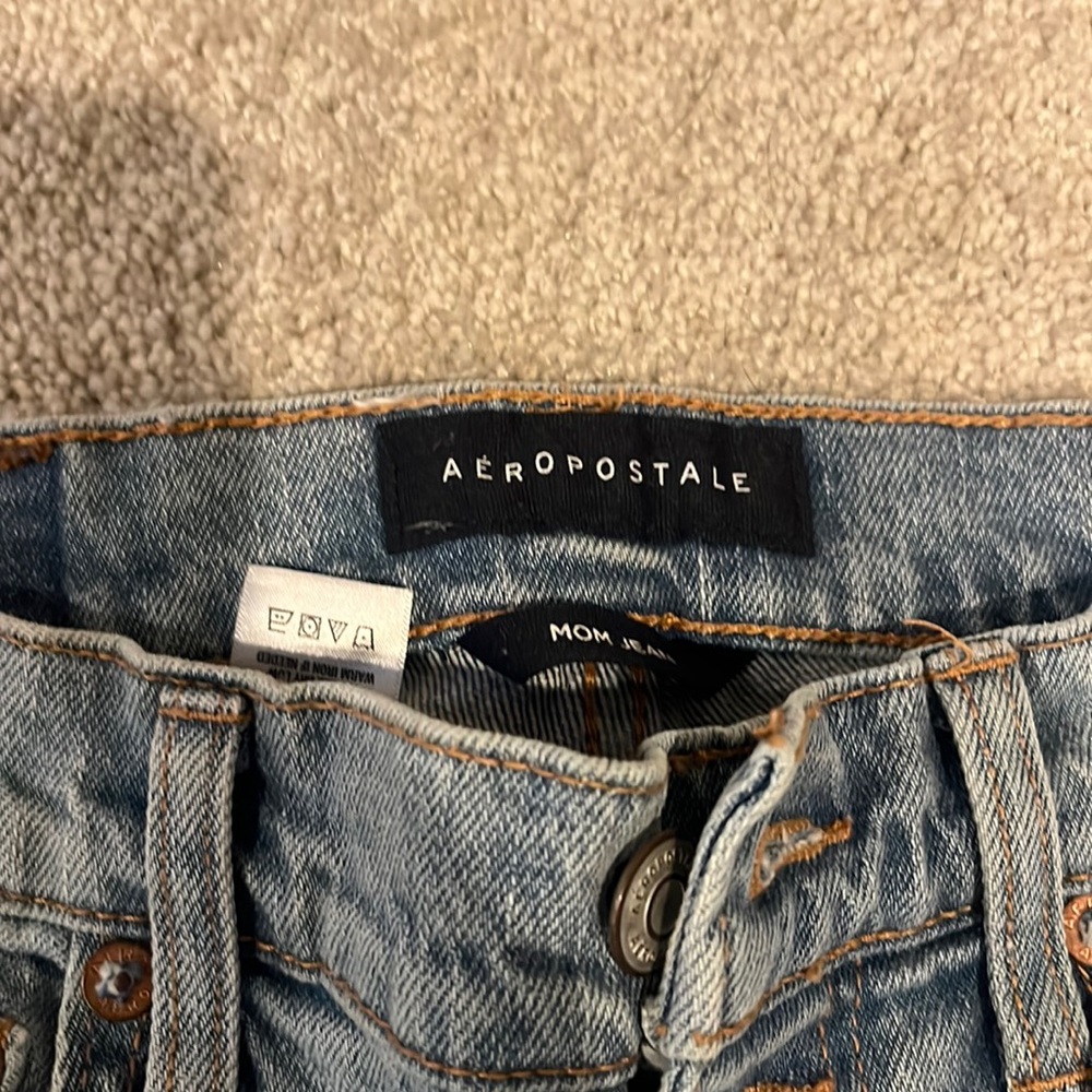 Button fly crop skinny jeans